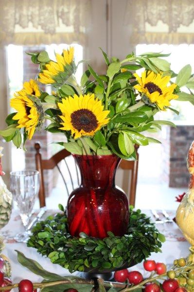 Flower Arrangements and Rooster Accents Creating Bold, Jazzy Table  Centerpieces